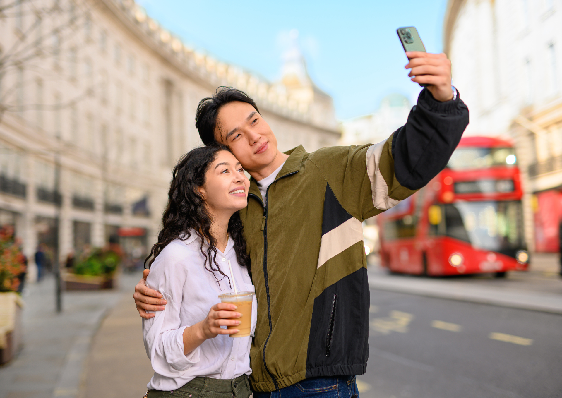 Couple taking selfie on Regent Street 