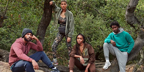 Group in activewear in a wood
