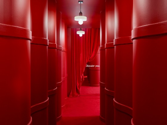 Pink corridor with a curtain at the end