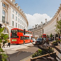 Regent street buildings, red busses and black cabs